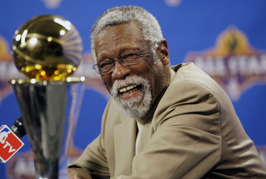 NBA great Bill Russell reacts at a news conference as he learns the most valuable player award for the NBA basketball championships has been renamed the Bill Russell NBA Finals Most Valuable Player Award, Feb. 14, 2009, in Phoenix. Russell has died at age 88. His family said on social media that Russell died on Sunday, July 31, 2022. Russell anchored a Boston Celtics dynasty that won 11 titles in 13 years. (AP Photo/Matt York, file) **FILE**