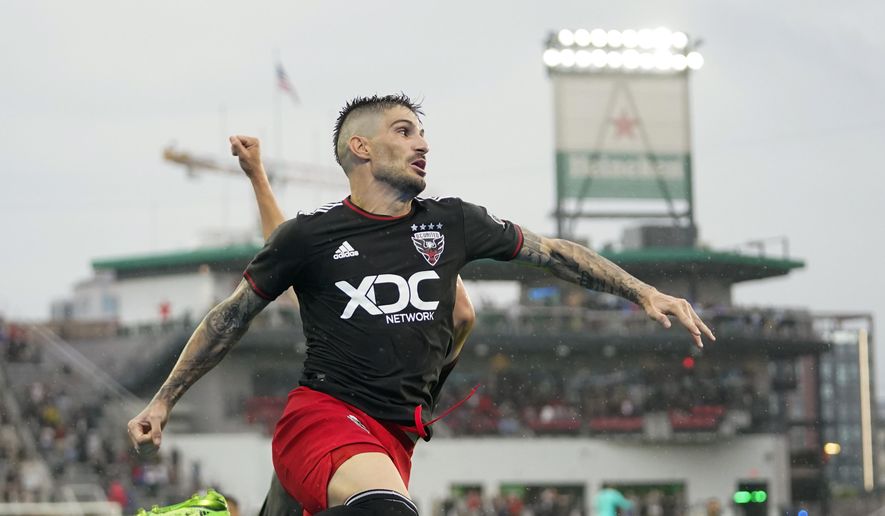 D.C. United forward Taxiarchis Fountas celebrates his second half goal against Orlando City during an MLS soccer match, Sunday, July 31, 2022, in Washington. D.C. United won 2-1. (AP Photo/Julio Cortez) **FILE**