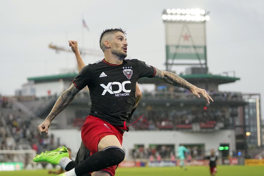 D.C. United forward Taxiarchis Fountas celebrates his second half goal against Orlando City during an MLS soccer match, Sunday, July 31, 2022, in Washington. D.C. United won 2-1. (AP Photo/Julio Cortez) **FILE**