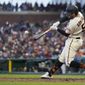 San Francisco Giants&#39; Luis Gonzalez hits a two-run home run against the Chicago Cubs during the fourth inning of a baseball game in San Francisco, Saturday, July 30, 2022. (AP Photo/Godofredo A. Vásquez)