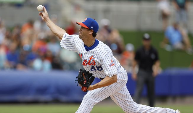 New York Mets&#x27; Jacob deGrom pitches for triple-A Syracuse against Omaha in what could be his last minor league rehab outing before rejoining New York&#x27;s rotation, in Syracuse, N.Y., Wednesday, July 27, 2022 (Scott Schild/The Post-Standard via AP) **FILE**