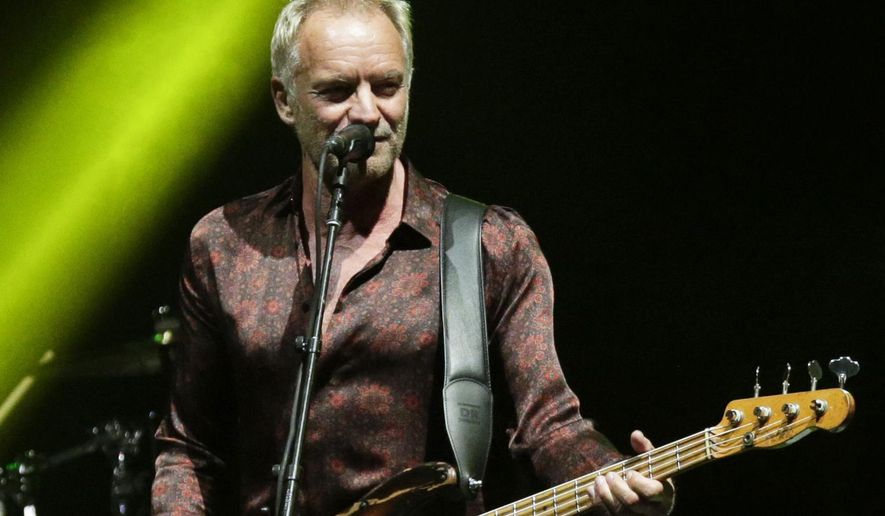 Singer Sting performs during a concert with singer Shaggy, as part of their &#39;The 44/876&#39; tour in Panama City, Oct. 19, 2018. British musician Sting has interrupted a concert in Warsaw to warn his audience that democracy is under attack worldwide. He also denounced the war in Ukraine as “an absurdity based upon a lie.” Sting asked a popular Polish actor to join him onstage to translate his appeal that democracy is worth fighting for despite it being messy and frustrating at times “because the alternative to democracy is a nightmare.” (AP Photo/Arnulfo Franco, File)