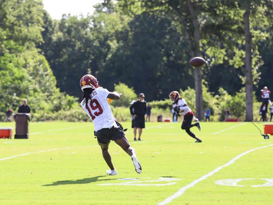 Washington Commanders Wide Reciever Marken Michel (19) following the pass to make a catch at Day 5 of Training Camp at The Park in Ashburn VA on August 1st 2022. (Photo: Alyssa Howell)