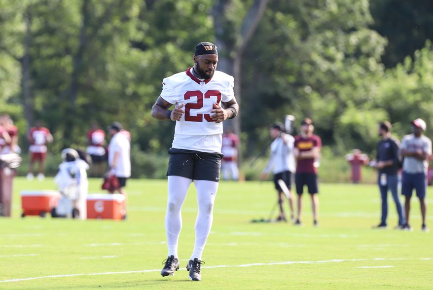Washington Commanders Running Back J.D. McKissic (23) doing stretches before practice at Day 5 of Training Camp at The Park in Ashburn VA on August 1st 2022. (Photo: Alyssa Howell)