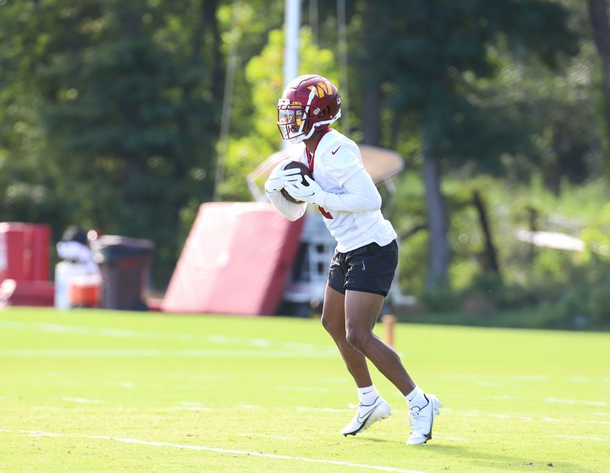 Washington Commanders Wide Receiver Jahan Dotson (1) making a catch before practice at Day 5 of Training Camp at The Park in Ashburn VA on August 1st 2022. (Photo: Alyssa Howell)