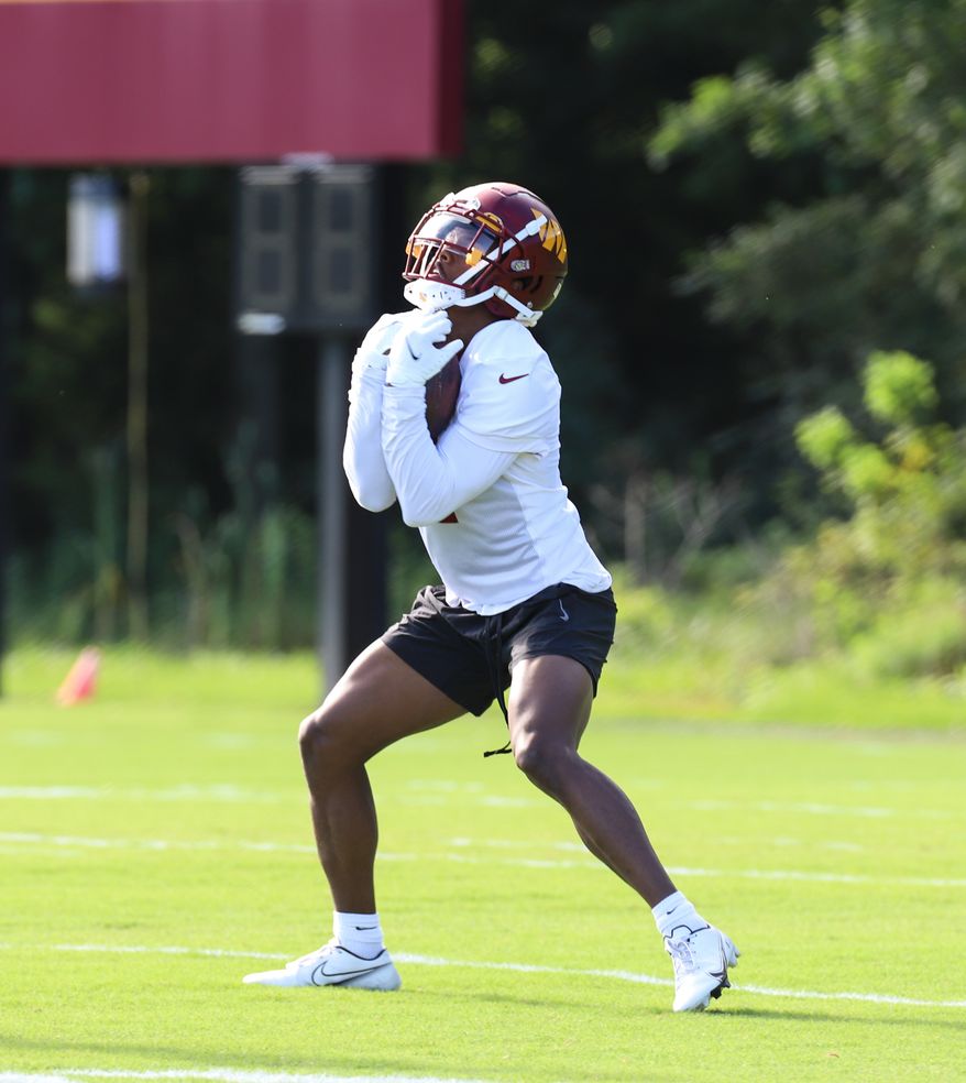 Washington Commanders Wide Receiver Jahan Dotson (1) making a catch before practice at Day 5 of Training Camp at The Park in Ashburn VA on August 1st 2022. (Photo: Alyssa Howell)