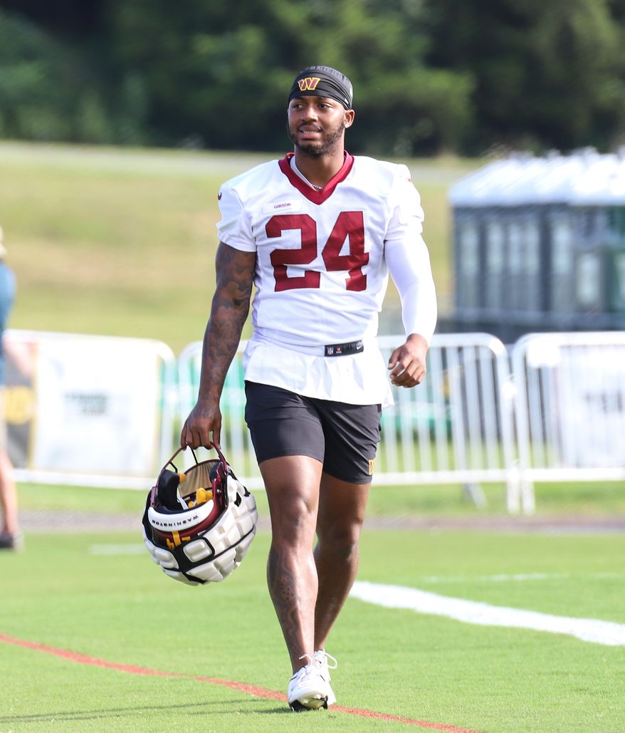 Washington Commanders Running Back Antonio Gibson (24) walking on the field before practice at Day 5 of Training Camp at The Park in Ashburn VA on August 1st 2022. (Photo: Alyssa Howell)