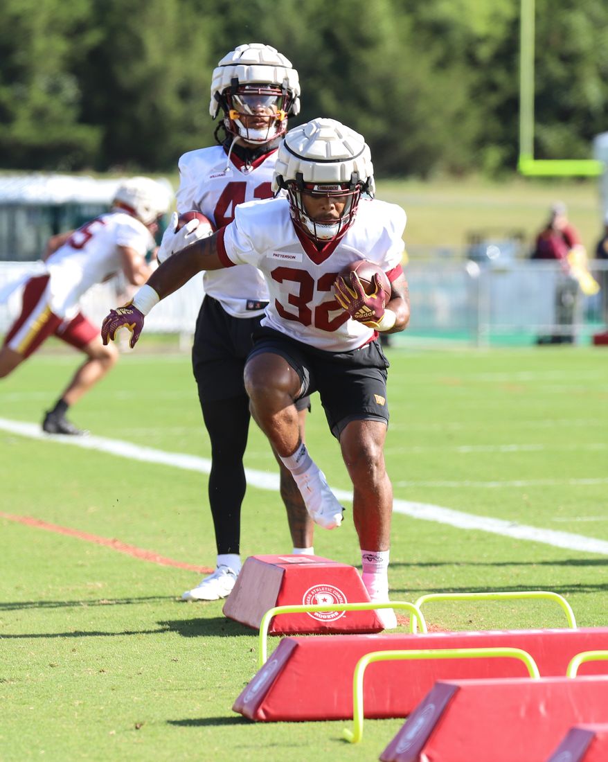 Washington Commanders Running Back Jaret Patterson (32) running through an obstacle at Day 5 of Training Camp at The Park in Ashburn VA on August 1st 2022. (Photo: Alyssa Howell)