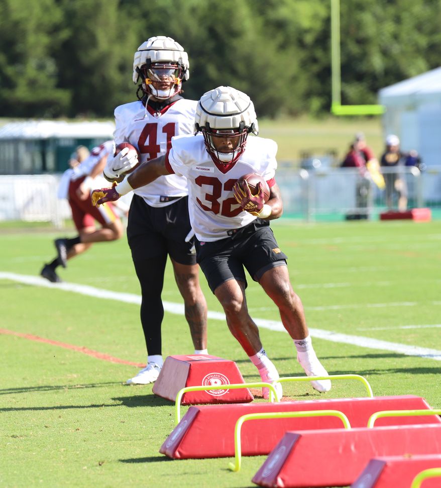Washington Commanders Running Back Jaret Patterson (32) running through an obstacle at Day 5 of Training Camp at The Park in Ashburn VA on August 1st 2022. (Photo: Alyssa Howell)