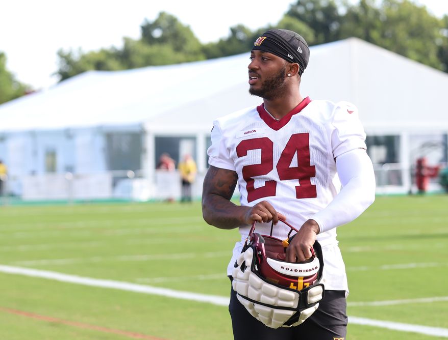 Washington Commanders Running Back Antonio Gibson (24) walking on the field before practice at Day 5 of Training Camp at The Park in Ashburn VA on August 1st 2022. (Photo: Alyssa Howell)