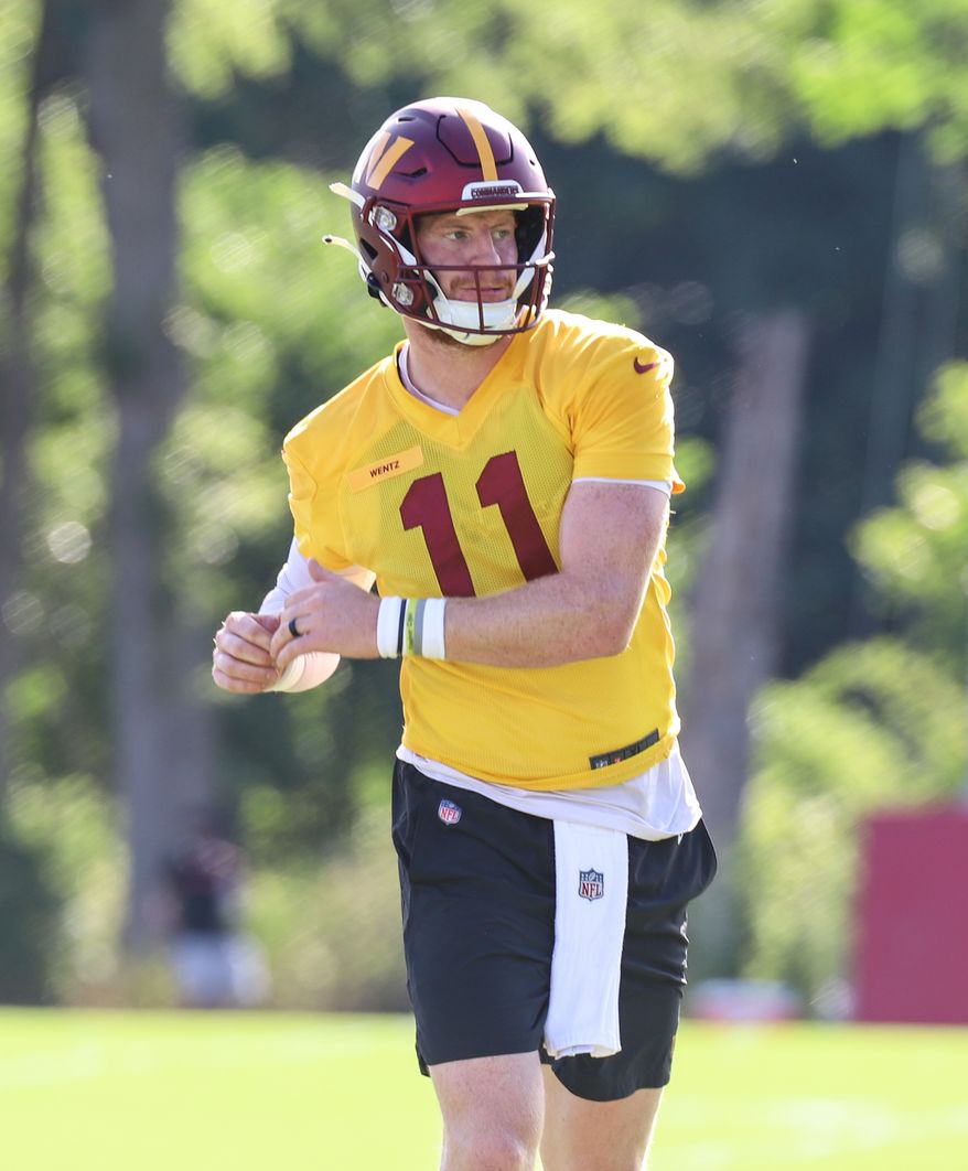 Washington Commanders Quarterback Carson Wentz (11) walks the field at Day 5 of Training Camp at The Park in Ashburn VA on August 1st 2022. (Photo: Alyssa Howell)