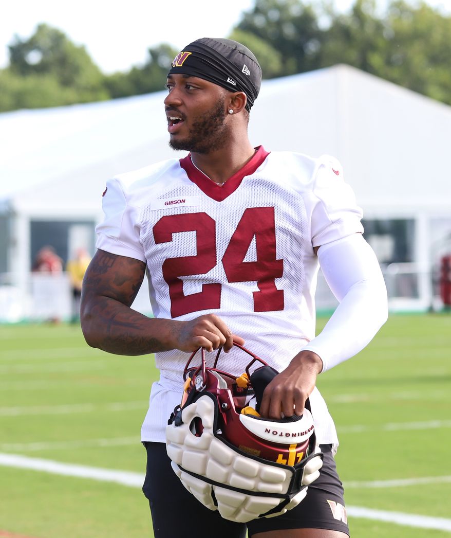 Washington Commanders Running Back Antonio Gibson (24) walking on the field before practice at Day 5 of Training Camp at The Park in Ashburn VA on August 1st 2022. (Photo: Alyssa Howell)
