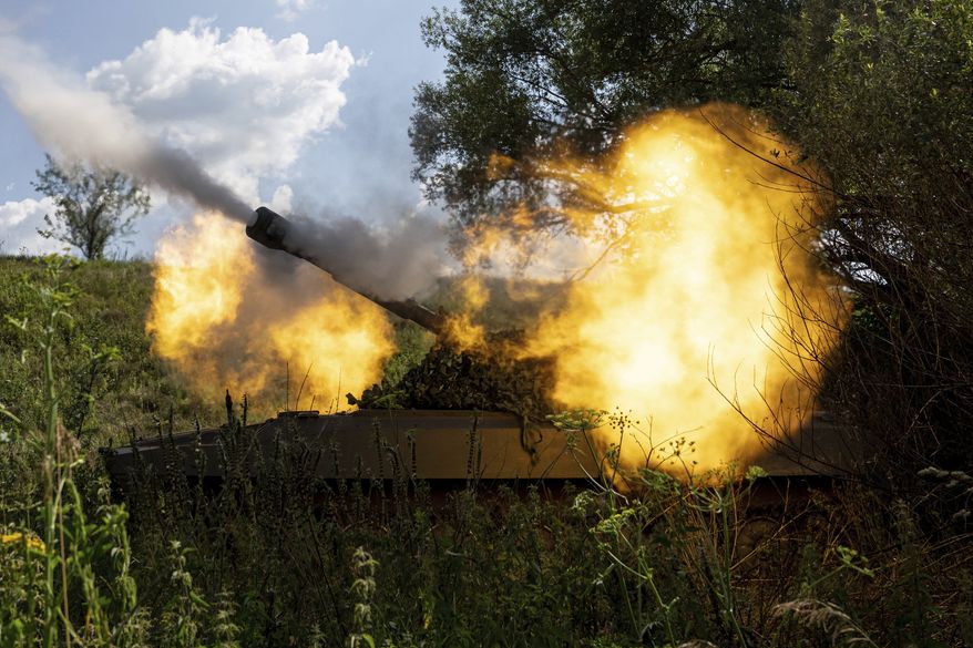 A Ukrainian self-propelled artillery shoots toward Russian forces at a frontline in Kharkiv region, Ukraine, on July 27, 2022. Even as the Russian war machine crawls across Ukraine’s east, trying to achieve the Kremlin’s goal of securing full control over the country’s industrial heartland of the Donbas, the Ukrainian forces are scaling up attacks to reclaim territory in the south. (AP Photo/Evgeniy Maloletka, File)