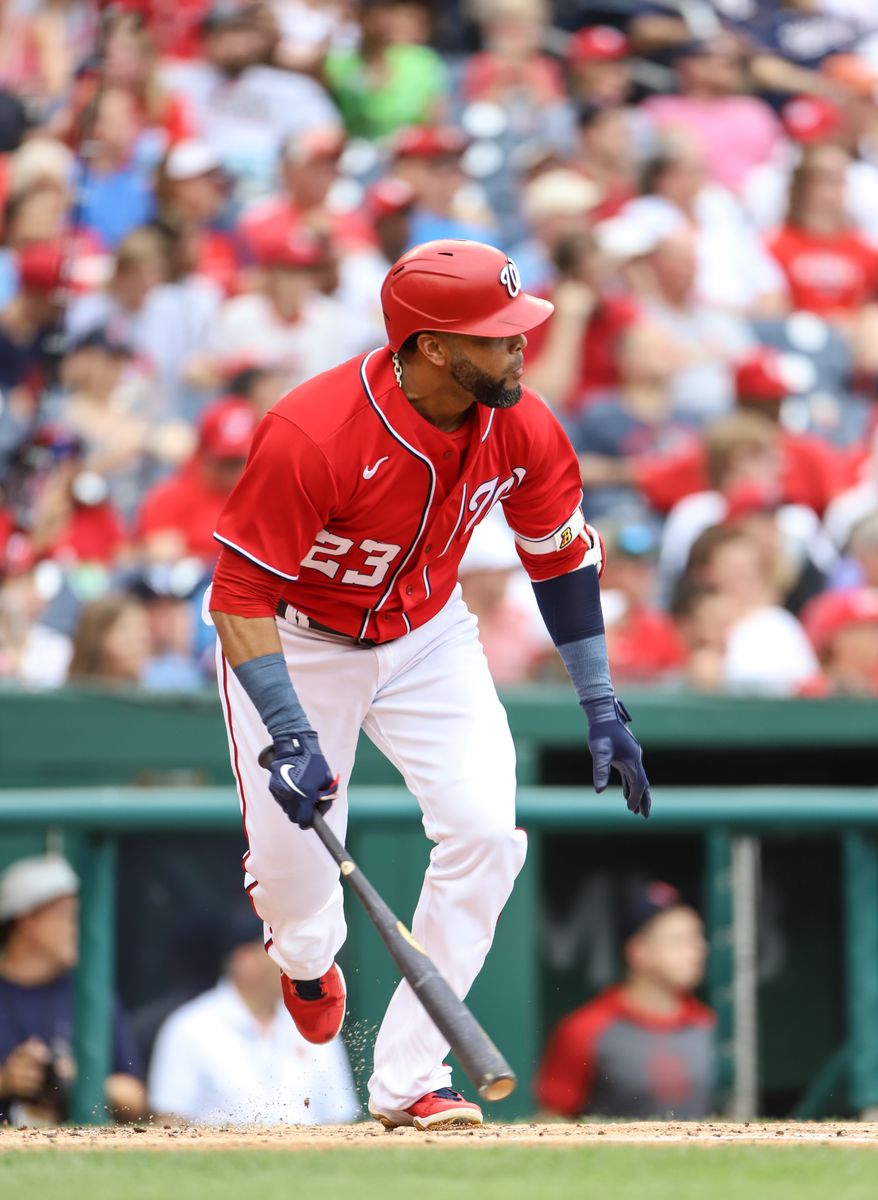 Designated Hitter Nelson Cruz (23) just about to drop the bat as he runs to first after hitting a single at the pitch at the Washington Nationals vs St. Louis Cardinals at Nationals Park in Washington D.C. on July 31st 2022 (Photo: All-Pro Reels/Alyssa Howell)