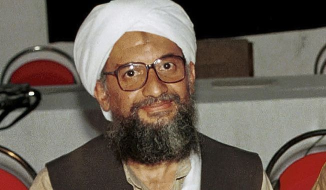In this 1998 file photo made available on March 19, 2004, Ayman al-Zawahri poses for a photograph in Khost, Afghanistan. Al-Zawahri, the top al-Qaida leader, was killed by the U.S. over the weekend in Afghanistan. President Joe Biden is scheduled to speak about the operation on Monday night, Aug. 1, 2022, from the White House in Washington. (AP Photo/Mazhar Ali Khan, File)