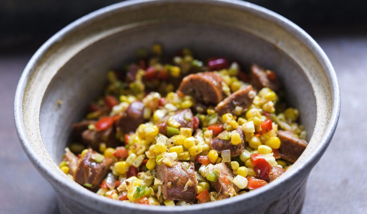 NextImg:Secret ingredient from summer corn lifts Cajun maque choux with andouille sausage