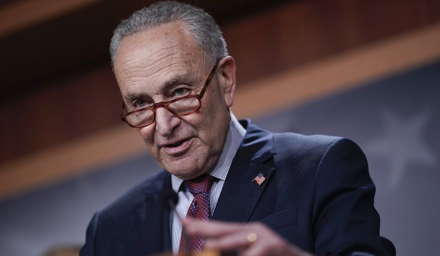 Senate Majority Leader Chuck Schumer, D-N.Y., speaks to reporters after a closed-door policy meeting, at the Capitol in Washington, Tuesday, Aug. 2, 2022. (AP Photo/J. Scott Applewhite)
