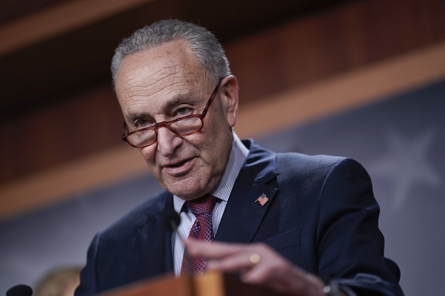 Senate Majority Leader Chuck Schumer, D-N.Y., speaks to reporters after a closed-door policy meeting, at the Capitol in Washington, Tuesday, Aug. 2, 2022. (AP Photo/J. Scott Applewhite)