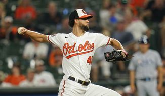 Baltimore Orioles relief pitcher Jorge Lopez throws a pitch to the Tampa Bay Rays during the 10th inning of a baseball game, Wednesday, July 27, 2022, in Baltimore. The Rays won 6-4 in ten innings. (AP Photo/Julio Cortez) **FILE**
