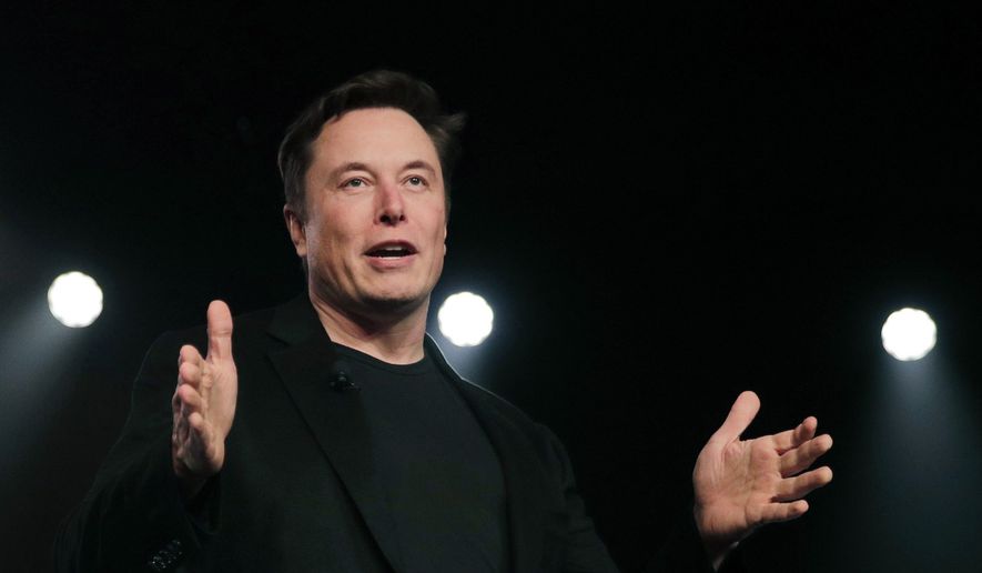 Tesla CEO Elon Musk speaks before unveiling the Model Y at Tesla&#39;s design studio in Hawthorne, Calif., March 14, 2019. (AP Photo/Jae C. Hong, File)