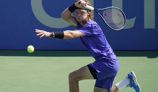 Russia&#39;s Andrey Rublev returns against Britain&#39;s Jack Draper during a match at the Citi Open tennis tournament in Washington, Tuesday, Aug. 2, 2022. (AP Photo/Carolyn Kaster)