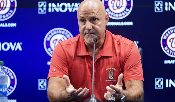 Washington Nationals general manager Mike Rizzo speaks with reporters about the team&#39;s recent trades before a baseball game against the New York Mets at Nationals Park, Tuesday, Aug. 2, 2022, in Washington. (AP Photo/Alex Brandon)