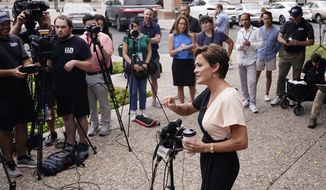 Kari Lake, Republican candidate for Arizona governor, addresses the media during a news conference Wednesday, Aug. 3, 2022, in Phoenix. (AP Photo/Ross D. Franklin)