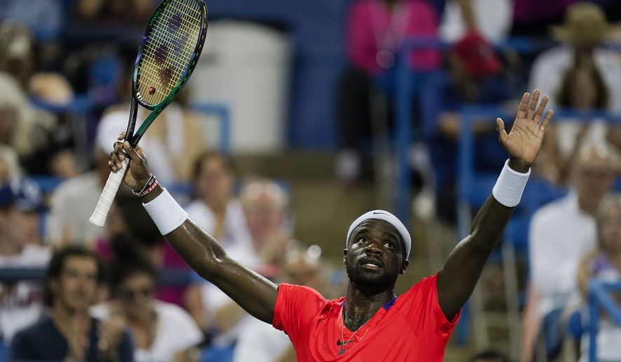 Frances Tiafoe, of the United States, celebrates after defeating Christopher Eubanks, of the United States, in the Citi Open tennis tournament in Washington, Wednesday, Aug. 3, 2022. (AP Photo/Carolyn Kaster)