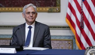 Attorney General Merrick Garland arrives to attend a virtual meeting with President Joe Biden in the Indian Treaty Room in the Eisenhower Executive Office Building on the White House Campus in Washington, Wednesday, Aug. 3, 2022. (AP Photo/Susan Walsh)