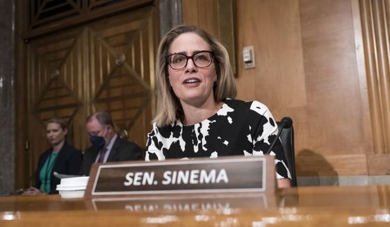 Sen. Kyrsten Sinema, D-Ariz., arrives for a meeting of the Senate Homeland Security Committee at the Capitol in Washington, Wednesday, Aug. 3, 2022. Sinema&#39;s views remained a mystery as party leaders eye votes later this week on their emerging economic legislation. (AP Photo/J. Scott Applewhite)