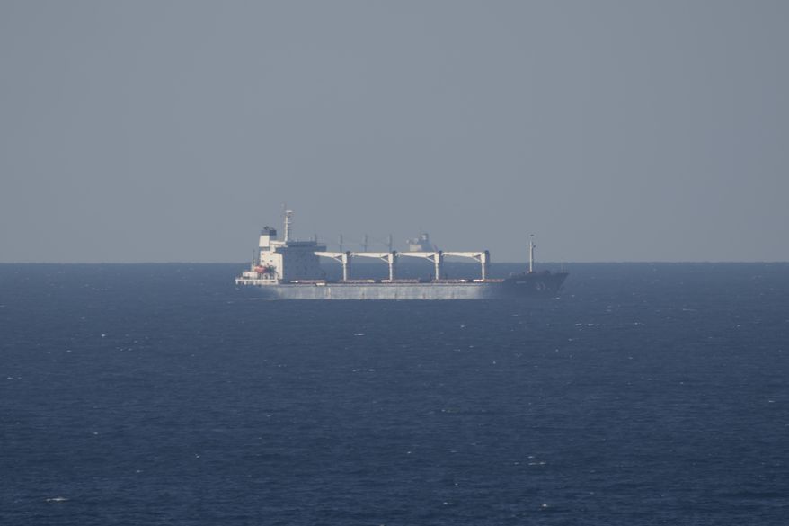 Cargo ship Razoni, arrives to the entrance of the Bosphorus Strait in Istanbul, Turkey, Tuesday, Aug. 2, 2022. Meanwhile, the first cargo ship to leave Ukraine since Russia invaded more than five months ago was off the coast of Bulgaria on Tuesday as it headed toward Istanbul and its final destination, Lebanon, putting to the test an agreement signed last month by Moscow and Kyiv to unblock Ukraine's agricultural exports and ease the global food crisis. (AP Photo/Khalil Hamra)