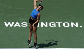 Daria Saville, of Australia, serves during a match against Jessica Pegula, of the United States, at the Citi Open tennis tournament in Washington, Wednesday, Aug. 3, 2022. (AP Photo/Carolyn Kaster)