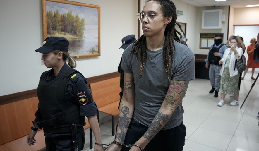 WNBA star and two-time Olympic gold medalist Brittney Griner is escorted from a court room after her last words, in Khimki just outside Moscow, Russia, Thursday, Aug. 4, 2022. Closing arguments in Brittney Griner&#39;s cannabis possession case are set for Thursday, nearly six months after the American basketball star was arrested at a Moscow airport in a case that reached the highest levels of US-Russia diplomacy. (AP Photo/Alexander Zemlianichenko)