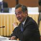 Chinese Foreign Minister Wang Yi smiles before the start of ASEAN-China Ministerial Meeting in Phnom Penh, Cambodia, Thursday, Aug 4, 2022. (AP Photo/Heng Sinith)