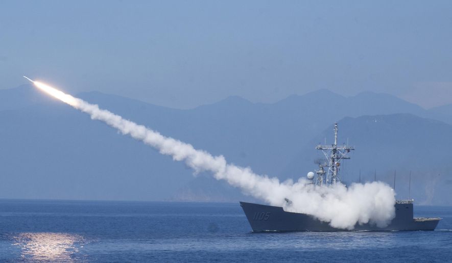 A Cheng Kung class frigate fires an anti-air missile as part of a navy demonstration in Taiwan&#x27;s annual Han Kuang exercises off the island&#x27;s eastern coast near the city of Yilan, Taiwan on July 26, 2022. Taiwan has put its military on alert and staged civil defense drills. (AP Photo/Huizhong Wu, File)
