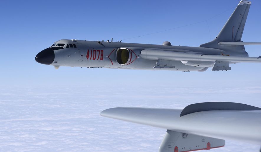 In this photo released by Xinhua News Agency, a Chinese military H-6K bomber is seen conducting training exercises, as the People&#x27;s Liberation Army (PLA) air force conducted a combat air patrol in the South China Sea on Nov. 23, 2017. China is staging live-fire military drills in six self-declared zones surrounding Taiwan in response to a visit by U.S. House Speaker Nancy Pelosi to the island Beijing claims as its own territory. (Wang Guosong/Xinhua via AP, File)