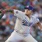 Los Angeles Dodgers&#39; Julio Urias pitches against the San Francisco Giants during the first inning of a baseball game in San Francisco, Wednesday, Aug. 3, 2022. (AP Photo/Jeff Chiu)