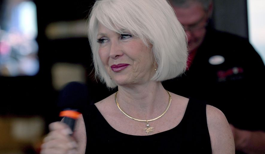 Tina Peters speaks to supporters at her election watch party in Sedalia, Colo., June 28, 2022. Colorado's secretary of state says a statewide recount has confirmed that indicted County Clerk Peters who alleged voting fraud lost her primary election last month. Democratic Secretary of State Jena Griswold said Thursday, Aug. 4, 2022, that Mesa County Clerk Peters picked up 13 more votes in the recount of the votes cast election to determine who the state's next Republican candidate for secretary of state. Peters ended up with about 29% of the votes cast. (AP Photo/Thomas Peipert, File)