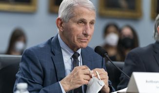 Dr. Anthony Fauci, director of the National Institute of Allergy and Infectious Diseases, testifies to a House Committee on Appropriations subcommittee on Labor, Health and Human Services, Education, and Related Agencies hearing, about the budget request for the National Institutes of Health, Wednesday, May 11, 2022, on Capitol Hill in Washington. A West Virginia man was sentenced Thursday, Aug. 4, 2022, to three years in federal prison after sending emails that threatened Fauci and other health officials for talking about the coronavirus and efforts to prevent it from spreading. (AP Photo/Jacquelyn Martin, File)