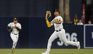 San Diego Padres right fielder Juan Soto makes the catch for the out on Colorado Rockies&#39; Brendan Rodgers during the sixth inning of a baseball game Wednesday, Aug. 3, 2022, in San Diego. (AP Photo/Gregory Bull)