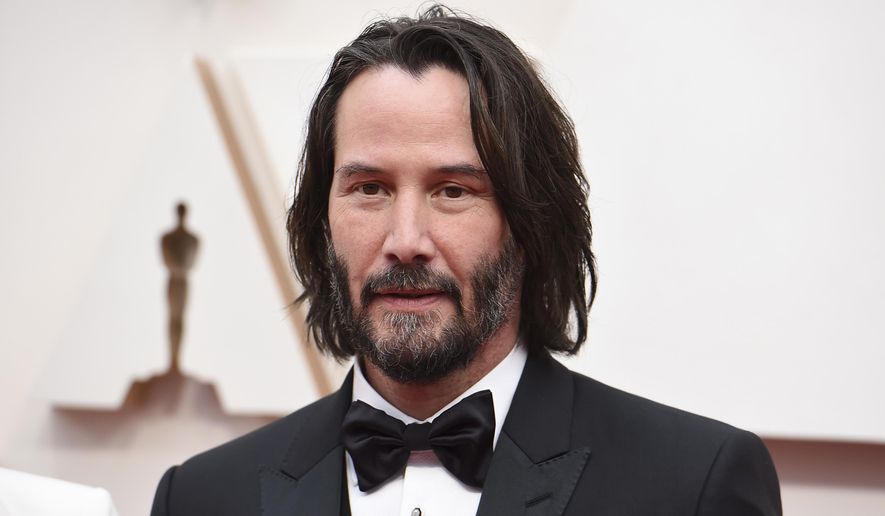 Keanu Reeves appears at the Oscars in Los Angeles on Feb. 9, 2020. (Photo by Jordan Strauss/Invision/AP) **FILE**