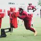 Washington Commanders Defensive Tackle Daron Payne (94) gets ready to tackle the football sled at Training Camp  at The Park in Ashburn VA on August 5th 2022 (Photo: Alyssa Howell)
