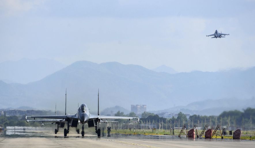 In this photo released by China&#x27;s Xinhua News Agency, air force and naval aviation corps of the Eastern Theater Command of the Chinese People&#x27;s Liberation Army (PLA) fly planes at an unspecified location in China, Thursday, Aug. 4, 2022. China conducted &amp;quot;precision missile strikes&amp;quot; Thursday in waters off Taiwan&#x27;s coasts as part of military exercises that have raised tensions in the region to their highest level in decades following a visit by U.S. House Speaker Nancy Pelosi. (Fu Gan/Xinhua via AP)