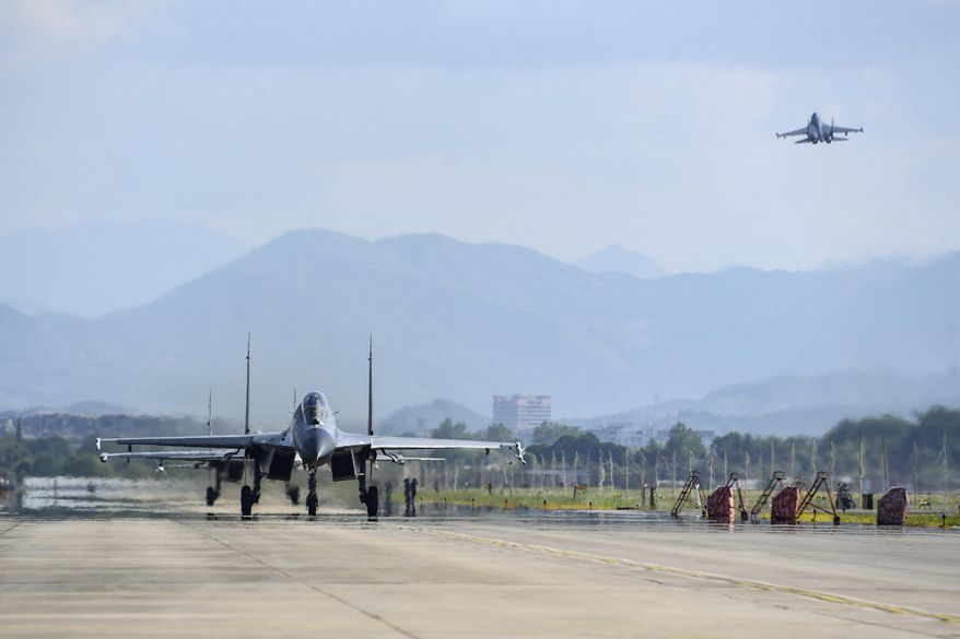In this photo released by China&#39;s Xinhua News Agency, air force and naval aviation corps of the Eastern Theater Command of the Chinese People&#39;s Liberation Army (PLA) fly planes at an unspecified location in China, Thursday, Aug. 4, 2022. China conducted &amp;quot;precision missile strikes&amp;quot; Thursday in waters off Taiwan&#39;s coasts as part of military exercises that have raised tensions in the region to their highest level in decades following a visit by U.S. House Speaker Nancy Pelosi. (Fu Gan/Xinhua via AP)