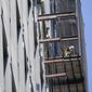 Construction workers is seen working on a high rise residential and commercial building under construction at the Essex Crossing development on the Lower East Side of Manhattan, Thursday, Aug. 4, 2022. On Friday, Aug. 5, the Labor Department delivers its July jobs report.  (AP Photo/Mary Altaffer)