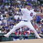 Chicago Cubs starting pitcher Drew Smyly winds up during the first inning of a baseball game against the Miami Marlins Saturday, Aug. 6, 2022, in Chicago. (AP Photo/Charles Rex Arbogast)