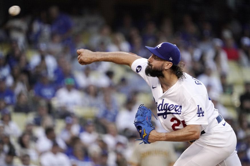 Los Angeles Dodgers starting pitcher Tony Gonsolin throws to the plate during the first inning of a baseball game against the San Diego Padres Friday, Aug. 5, 2022, in Los Angeles. (AP Photo/Mark J. Terrill)