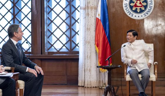 Secretary of State Antony Blinken, left, meets with Philippine President Ferdinand Marcos Jr. at the Malacanang Palace in Manila, Philippians, Saturday, Aug. 6, 2022. Blinken is on a ten day trip to Cambodia, Philippines, South Africa, Congo, and Rwanda. (AP Photo/Andrew Harnik, Pool)