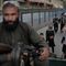 A Taliban fighter stands guard in the Shiite neighborhood of Dasht-e-Barchi, in Kabul, Afghanistan, Sunday, Aug. 7, 2022. (AP Photo/Ebrahim Noroozi)
