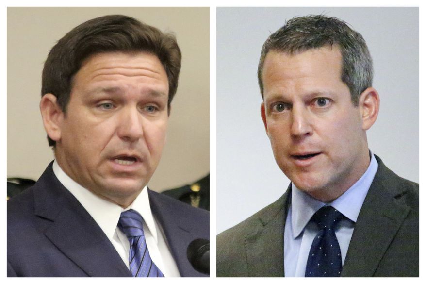 This combination of Thursday, Aug. 4, 2022 photos shows Florida Gov. Ron DeSantis, left, and Hillsborough County State Attorney Andrew Warren during separate news conferences in Tampa, Fla. On Sunday, Aug. 7, 2022, Warren vowed to fight his suspension from office by DeSantis over his promise not to enforce the state&#39;s 15-week abortion ban and support for gender transition treatments for minors. (Douglas R. Clifford/Tampa Bay Times via AP)